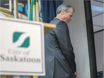  ?? LIAM RICHARDS ?? Saskatoon city manager Murray Totland leaves the room after announcing his retirement at City Hall on Friday. Totland said the time is right for him to leave, but added he will continue to live in the city.