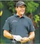  ?? Andrew Redington Getty Images ?? PHIL MICKELSON can laugh after Sunday’s 71.