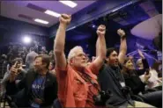  ?? MARCIO JOSE SANCHEZ — THE ASSOCIATED PRESS ?? People at NASA’s Jet Propulsion Laboratory in Pasadena celebrate Monday as the InSight lander touches down on Mars.