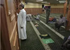  ?? Jessie Wardarski/Associated Press ?? A member of the Abubakar As-Saddique Islamic Center recites the Islamic call to prayer, or adhan, in Minneapoli­s.