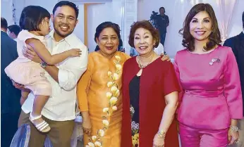  ??  ?? From left: Public Works Sec. Mark Villar with daughter Emma Therese, Sen. Cynthia Villar, Vicky Ramos-Antonino and Joanne Rae Ramirez who was Grace’s teacher in Assumption Convent
