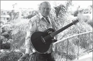  ?? The Associated Press ?? SWAN SONG: In this July 27, 2011, photo, musician Glen Campbell poses for a portrait in Malibu, Calif. Recorded before Alzheimer’s disease took his singing voice, Glen Campbell’s last album “Adios” was therapeuti­c for the legendary performer. Campbell,...