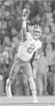  ?? Streeter Lecka / Getty Images ?? Kelly Bryant threw a pair of touchdown passes to help the No. 3 Tigers down No. 24 South Carolina at Columbia, S.C.