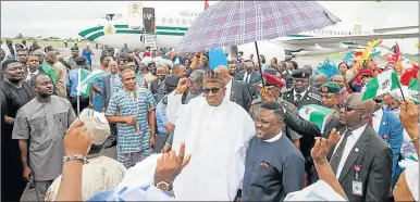  ?? Picture: REUTERS ?? WANTING AN END: Nigerian President Muhammadu Buhari (in white robes) wants to end the Boko Haram insurgency, which has seen one million children denied schooling. More than 2 000 schools are closed across Nigeria, Cameroon, Chad and Niger