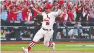  ?? JEFF CURRY / USA TODAY ?? St. Louis Cardinals’ Kolten Wong scores on an RBI sacrifice fly in the 10th inning to defeat the Atlanta Braves.