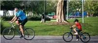  ?? Photos by Neeraj Murali ?? Residents enjoy a breath of fresh air at Umm Suqeim park following the reopening of the park on Saturday. —