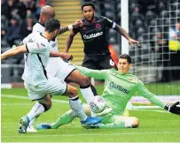  ??  ?? SWANS ON TOP Swansea scorer Borja Baston has one saved