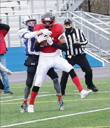  ?? Photo by Ernest A. Brown ?? Tolman senior Leandro DePina, above, caught touchdown passes in the first and third quarters to help the Tigers earn a 28-7 non-league victory over Middletown on Saturday. The Tigers face Moses Brown to finish the regular season.