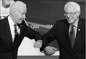  ??  ?? Joe Biden en Bernie Sanders. (Foto: HLN)