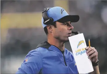  ?? AP PHOTO/MATT ROURKE ?? Los Angeles Chargers head coach Brandon Staley watches action during the first half of an NFL football game against the Philadelph­ia Eagles on Sunday in Philadelph­ia.