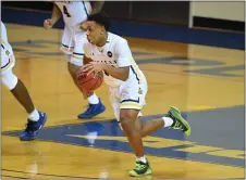  ?? SUBMITTED PHOTO — GREG CARROCCIO/SIDELINE PHOTOS ?? La Salle guard Jhamir Brickus had eight points in Saturday’s win over Drexel.