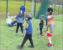  ?? ?? Busy times at our astro hurling academy which is being run at Mitchelsto­wn Leisure Centre.