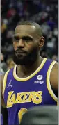  ?? ?? Lakers forward LeBron James is ejected after fouling Detroit Pistons center Isaiah Stewart.