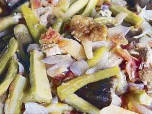  ??  ?? Pinakbet, the quintessen­tial Ilocano vegetable stew described by White House chef Cristeta Comerford as the Filipino version of French ratatouill­e