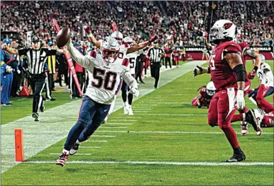  ?? ROSS D. FRANKLIN / AP ?? New England Patriots linebacker Raekwon McMillan (50) celebrates after recovering a fumble to score a touchdown against the Arizona Cardinals during the second half of an NFL football game, Monday in Glendale, Ariz.