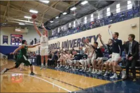  ?? TIM PHILLIS — FOR THE NEWS-HERALD ?? John Carroll’s Connor Fitzgerald shoots against Wilmington on Feb. 16 at John Carroll.