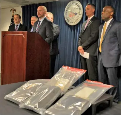  ?? STAFF PHOTO BY CHRIS CHRISTO ?? DRUG DANGER: U.S. Attorney Andrew Lelling announces the arrest of dozens of individual­s on federal drug, firearms and immigratio­n offenses yesterday and the seizure of 20 pounds of fentanyl.