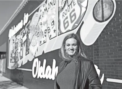  ?? “Bringing public and private entities together to foster partnershi­ps that will bring vital projects to fruition is essential,” says Leana Dozier, Edmond’s new downtown transforma­tion manager. SARAH PHIPPS/THE OKLAHOMAN ??