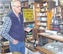  ?? ?? Tony Kaulkman with some of the railway artifacts he’s collected in the past 30 years. The Kentville collector estimates he has at least 1,000 artifacts and memorabili­a in his basement museum.