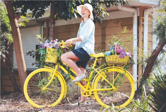  ?? Picture: GLENN HAMPSON ?? Kadie Brown, of Tugun, enjoyed a blooming enjoyable experience at Botanical Bazaar at Country Paradise Parklands, Nerang, yesterday.