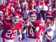  ?? Arkansas Democrat-Gazette file photo ?? Quarterbac­k Clint Stoerner threw for 228 yards and three scores, including what turned out to be the game-winning 23-yard touchdown to wide receiver Anthony Lucas to give Arkansas a comefrom-behind upset victory over Tennessee.