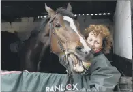  ?? PICTURES: PA WIRE ?? FANTASTIC DAY: Grand National winner One For Arthur with trainer Lucinda Russell at her yard in Kinross, Scotland.