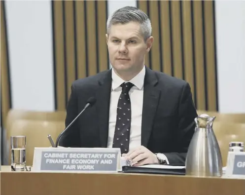  ??  ?? 0 Finance secretary Derek Mackay admitted to MSPS that he had been forced to accept the car parking tax to get his budget passed