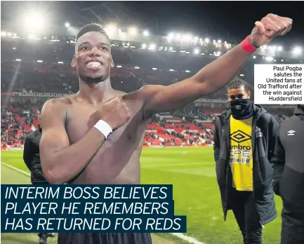  ??  ?? Paul Pogba salutes the United fans at Old Trafford after the win against Huddersfie­ld