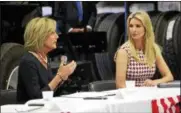 ??  ?? Congresswo­man Claudia Tenney, R-22, left, and Ivanka Trump discuss the effects of tax-reform at the Suit-Kote roundtable on Monday, July 9, 2018.