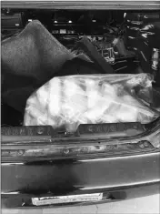  ?? LOANED PHOTO/YUMA SECTOR BORDER PATROL ?? YUMA SECTOR BORDER PATROL AGENTS FROM THE WELLTON STATION FOUND 66 PACKAGES OF DRUGS hidden in the rear quarter panels and under the floor of the rear passenger seat of a 2011 gold Chevrolet Equinox on Sunday at the Immigratio­n Checkpoint on Interstate...