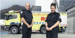  ?? PHOTO: TRACEY ROXBURGH ?? New grads . . . Two of Queenstown Airport’s newest rescue fire graduates Gavin Mason and Aroha Hyland, who have now qualified to become deputy crew chiefs. The other Queenstown graduates were Jordan Lineman and Richard Stokes.