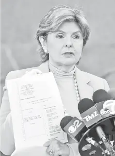  ?? — AFP photo ?? Attorney Allred speaks to the media outside Los Angeles County Superior Court in Los Angeles, California on Wednesday after filing a lawsuit on behalf of a young woman against Brown and a fellow rapper.