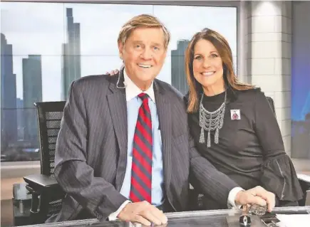  ?? ?? Steve Sanders on his last day on the set with his long-time co-anchor of WGN’s Midday News, Dina Bair. (Photo courtesy of WGN)