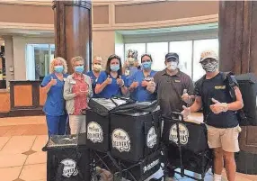  ?? BAPTIST MEMORIAL HEALTH CARE ?? Workers at Baptist Memorial Hospital-desoto enjoy the lunch from pop star Lizzo.