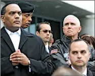  ?? AP/LEE JIN-MAN ?? Vice President Mike Pence (back, right) visits the border village of Panmunjom on Monday in the Demilitari­zed Zone between North and South Korea.