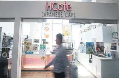  ?? VINCE TALOTTA PHOTOS/TORONTO STAR ?? HCafe owner Hiroyoshi Okawa hopes to introduce more Japanese foods to Canadians, since he loves the cuisine himself.