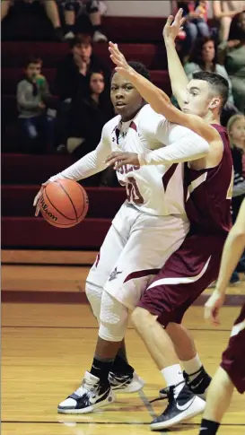  ??  ?? Chattanoog­a Valley’s Kobe Lewis muscles his way in the lane through a Dade County defender. Lewis had back-to-back double-doubles last week to give the Eagles a pair of wins heading into this week’s NGAC tournament at Gordon Lee. (Messenger photo/Scott...