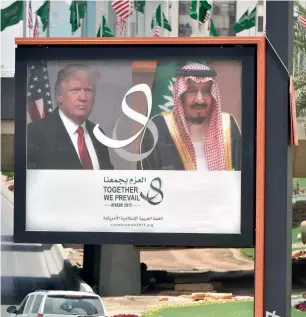  ?? AFP ?? A billboard bearing portraits of US President Donald Trump and Saudi Arabia’s King Salman, is seen on a main road in Riyadh, on Friday. Trump, on his first foreign trip will tell Muslim leaders of his “hopes for a peaceful vision of Islam” as he seeks support for the war against radicals. —