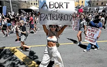  ?? AP ?? This protest march in Los Angeles was one of many across the United States this weekend.