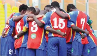  ??  ?? Accra Hearts of Oak players praying in the Glo League in Ghana