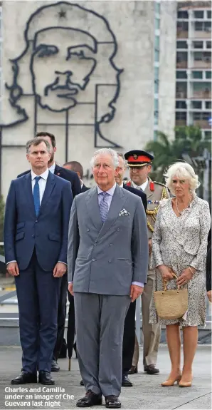  ??  ?? Charles and Camilla under an image of Che Guevara last night