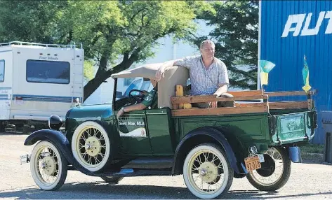  ?? PHOTO COURTESY OF SCOTT MOE ?? Scott Moe is a truck guy, even when he’s in parades, in this 1929 Ford Model A.