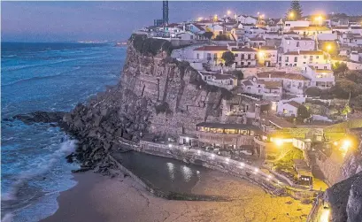  ?? DANIEL RODRIGUES THE NEW YORK TIMES FILE PHOTO ?? The seaside town of Colares, Portugal. The country is currently allowing flights from Canada, the U.S. and Brazil, among others.