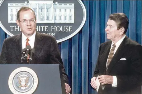  ?? Mike Sargent AFP/Getty Images ?? PRESIDENT REAGAN nominated federal appeals Judge Anthony M. Kennedy of California, left, to the Supreme Court in 1987. Kennedy was reliably conservati­ve initially but often voted with the court’s liberals, beginning with cases on abortion rights and prayer in schools.