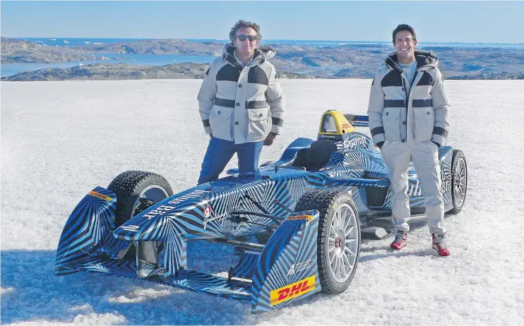  ?? — WILL GRAY/DRIVING.CA ?? Formula E chief executive Alejandro Agag, left, and driver Lucas di Grassi with the Formula E car on the cold and desolate Greenland ice cap.