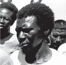  ??  ?? An emaciated Oiva Angula among a group of Swapo fighters who were held in the notorious Lubango detainee camp. Angula left his home in Windhoek at the age of 19 and went into exile in Angola, where he joined Swapo’s military wing, PLAN. During a series...