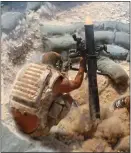  ??  ?? ELITE: A Para fires an 81mm mortar