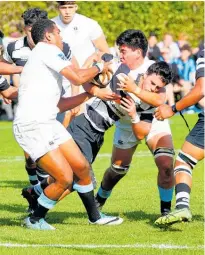  ??  ?? Collegiate’s Phoenix Kairimu, seen here making a tackle, was named school leaver of the year.