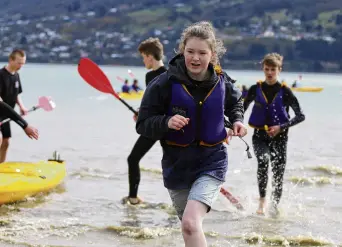  ?? PHOTO: SUPPLIED ?? Transition time . . . Neve Curtis (Logan Park High School) runs in after her kayak leg in the Get2Go adventure race last week.