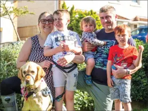  ??  ?? Charlie Galligan with parents Rebecca and Bryan, brothers BillyDee and Alfie with Iona.